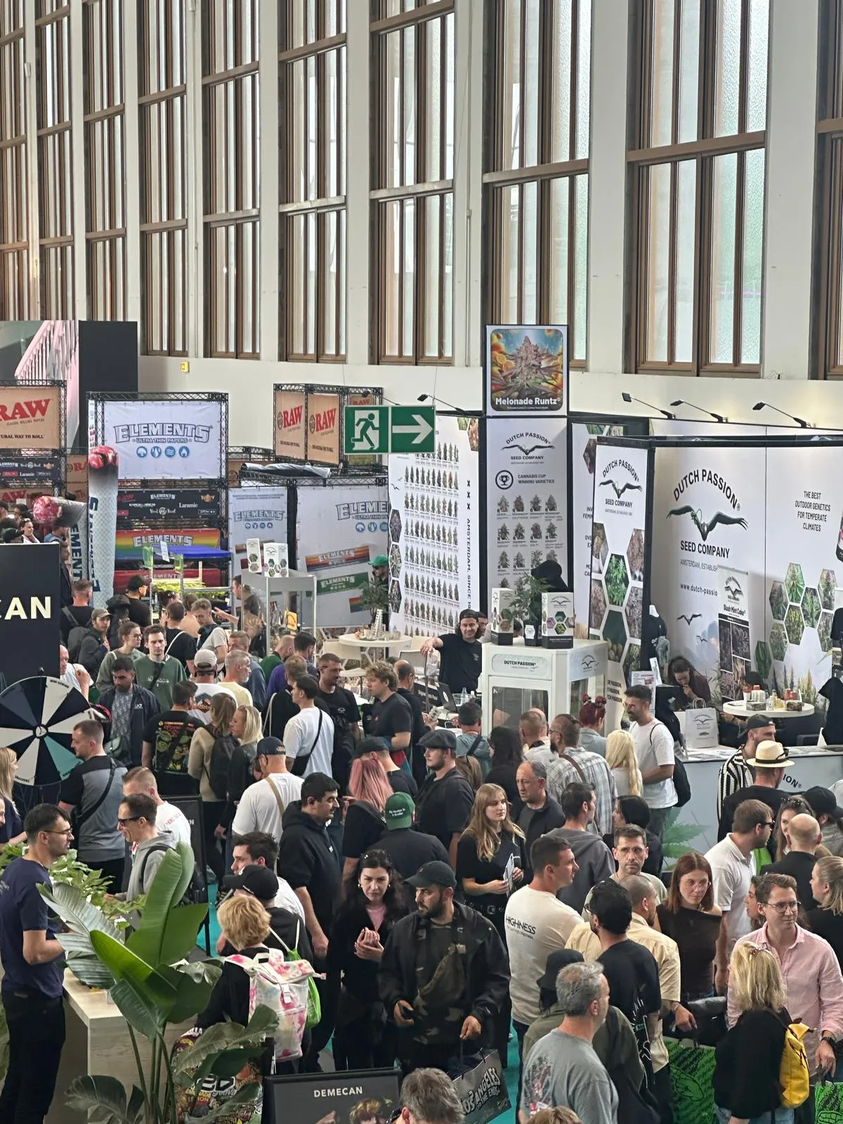 Packed exhibition hall full of cannabis brand booths at Mary Jane Berlin 2026
